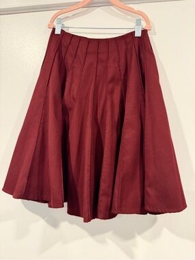 Girls burgundy a line pleated knee length skirt